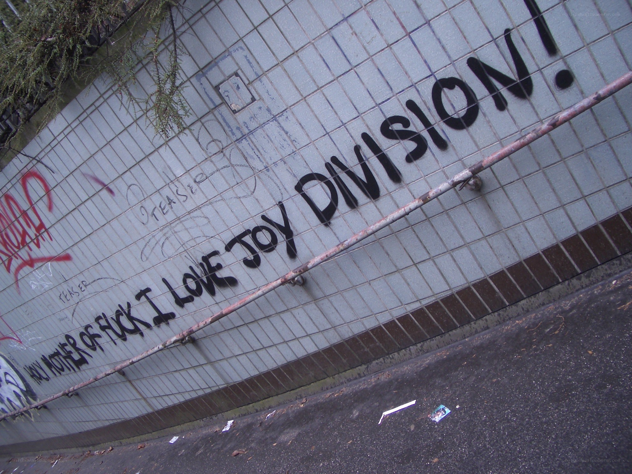 graffiti on tiled wall