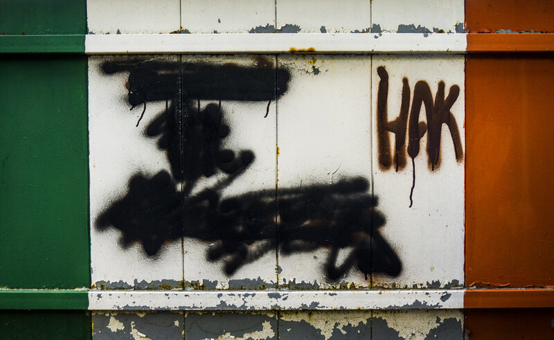 Graffiti on Tiled Wall — White