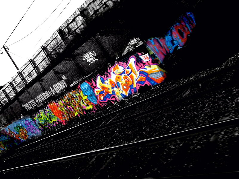 Graffiti on Train Wall — Black, Dramatic