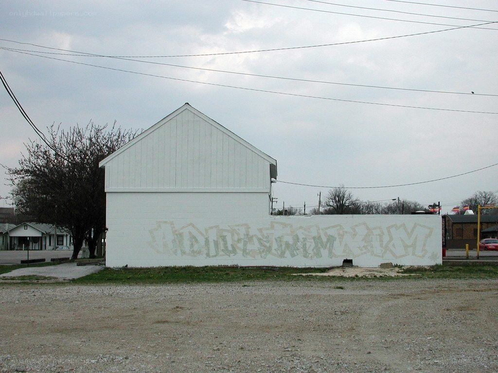 graffiti on white building