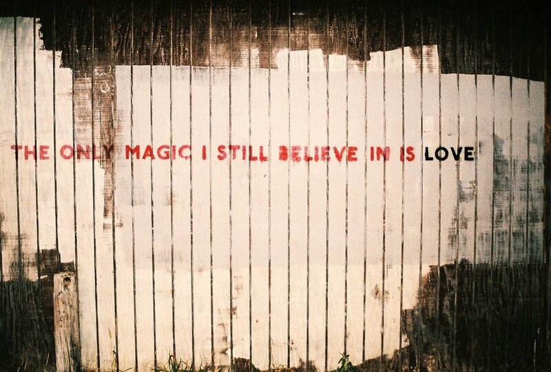 graffiti on wooden fence