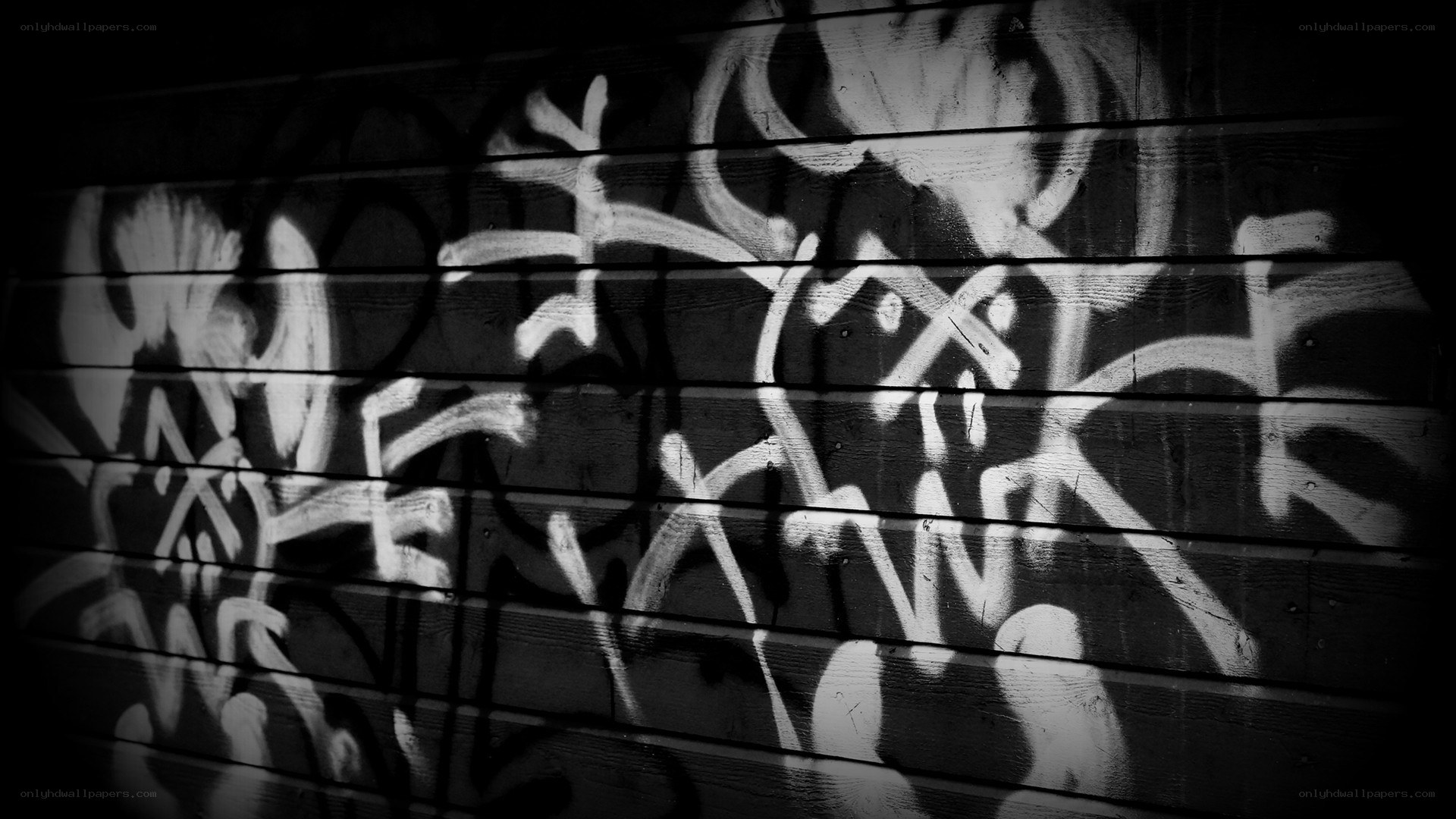 graffiti on wooden wall