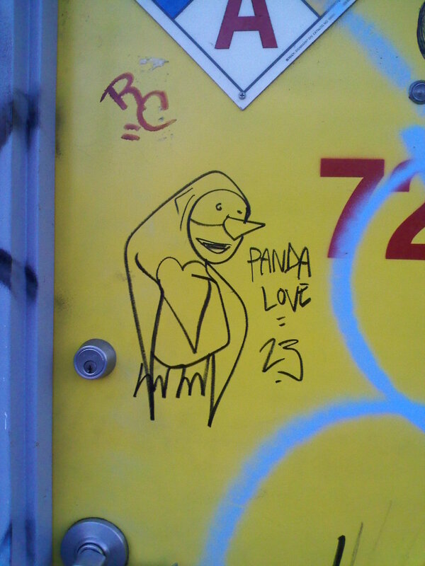 graffiti on yellow door
