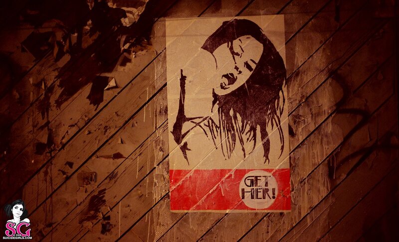 graffiti poster on wooden wall