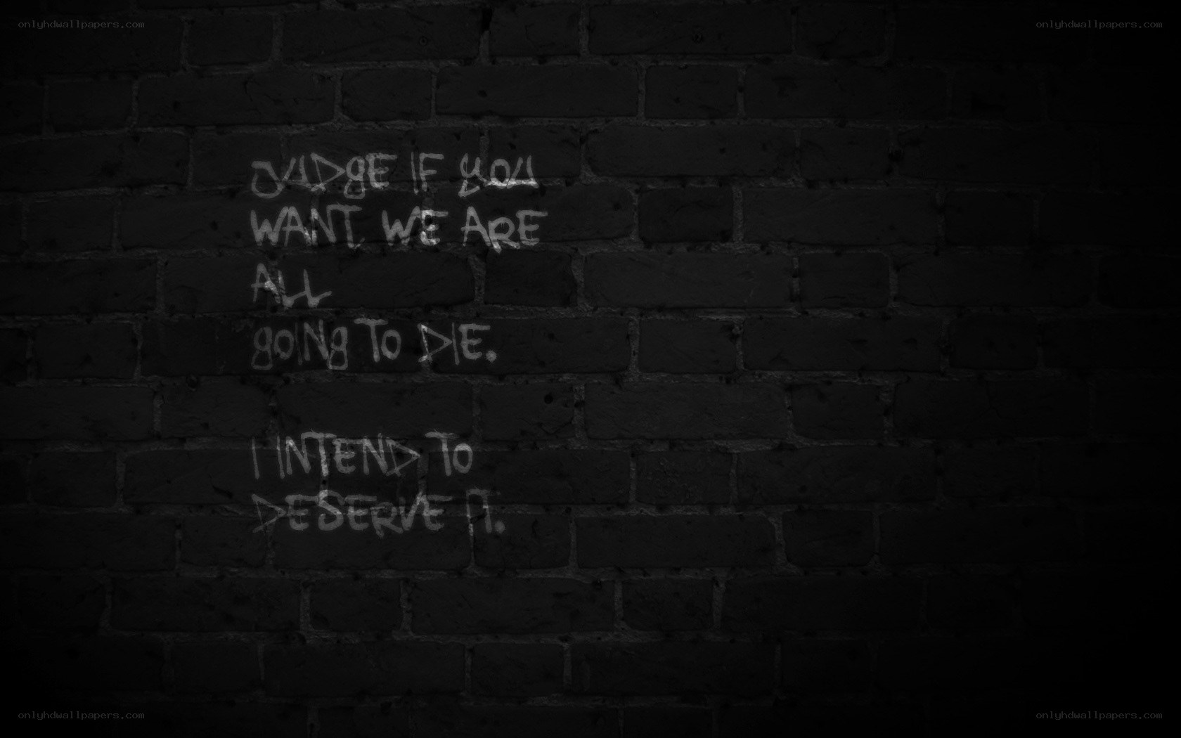 graffiti quote on brick wall