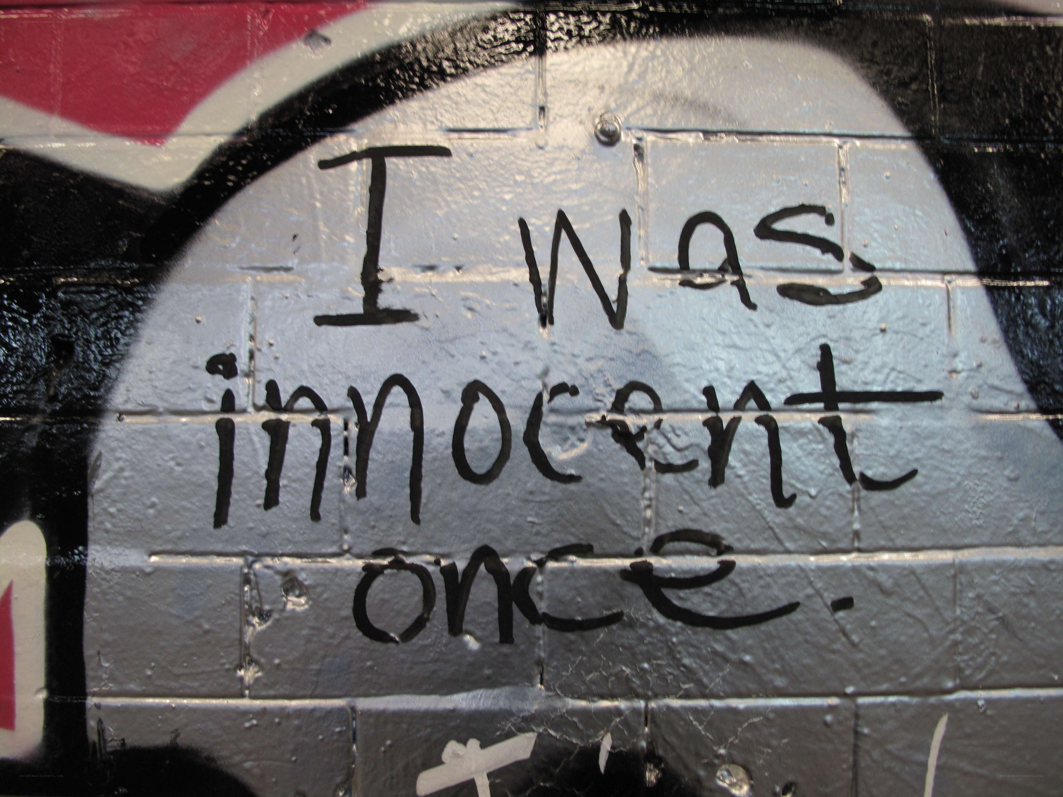 graffiti reading 'I was innocent once'