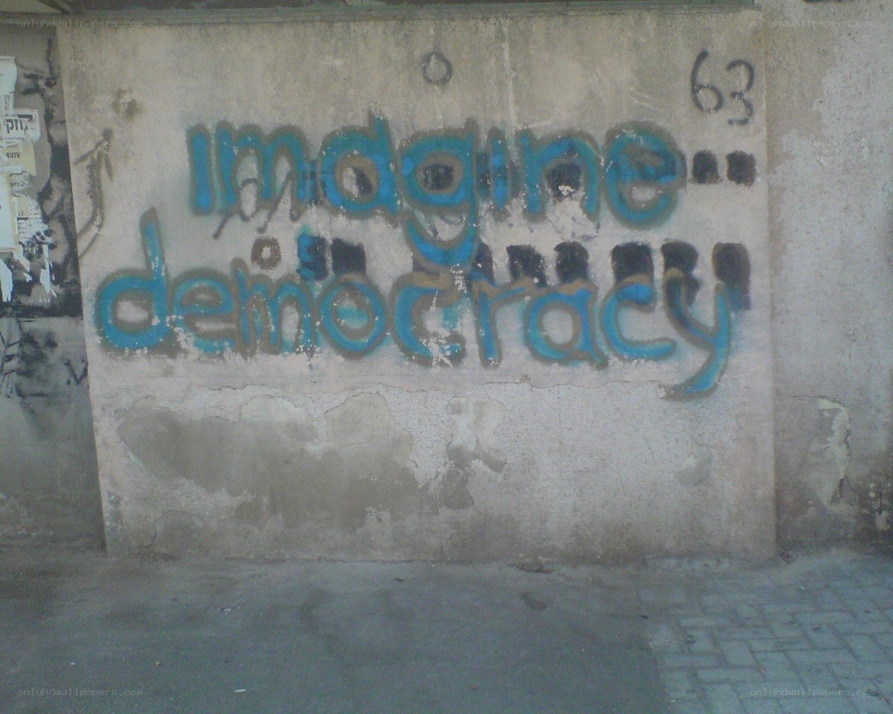 Graffiti reading 'Imagine democracy'