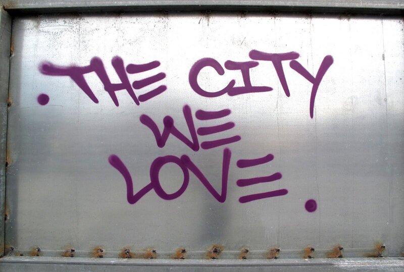 graffiti reading the city we love