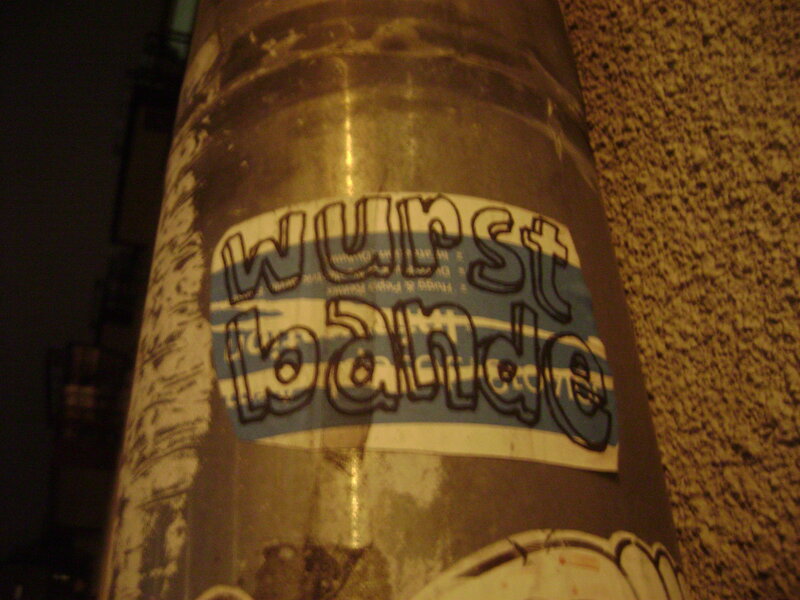 graffiti sticker on a pole