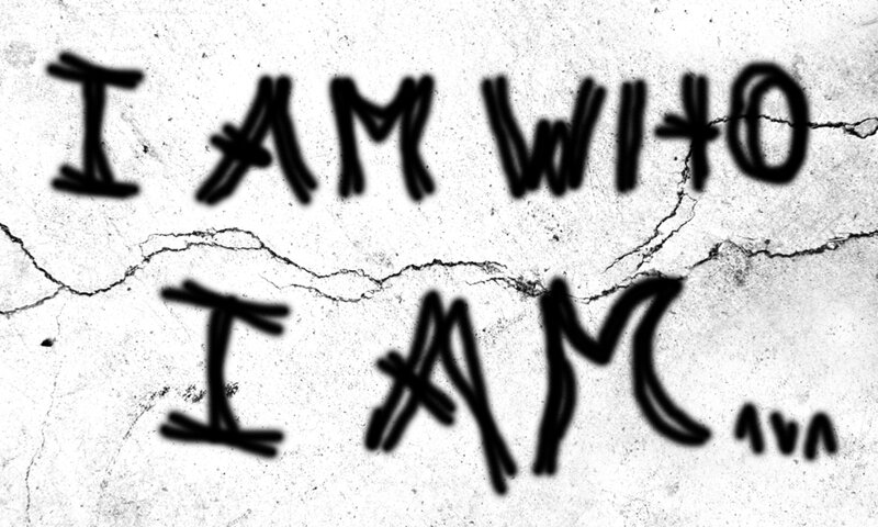 graffiti text on cracked wall