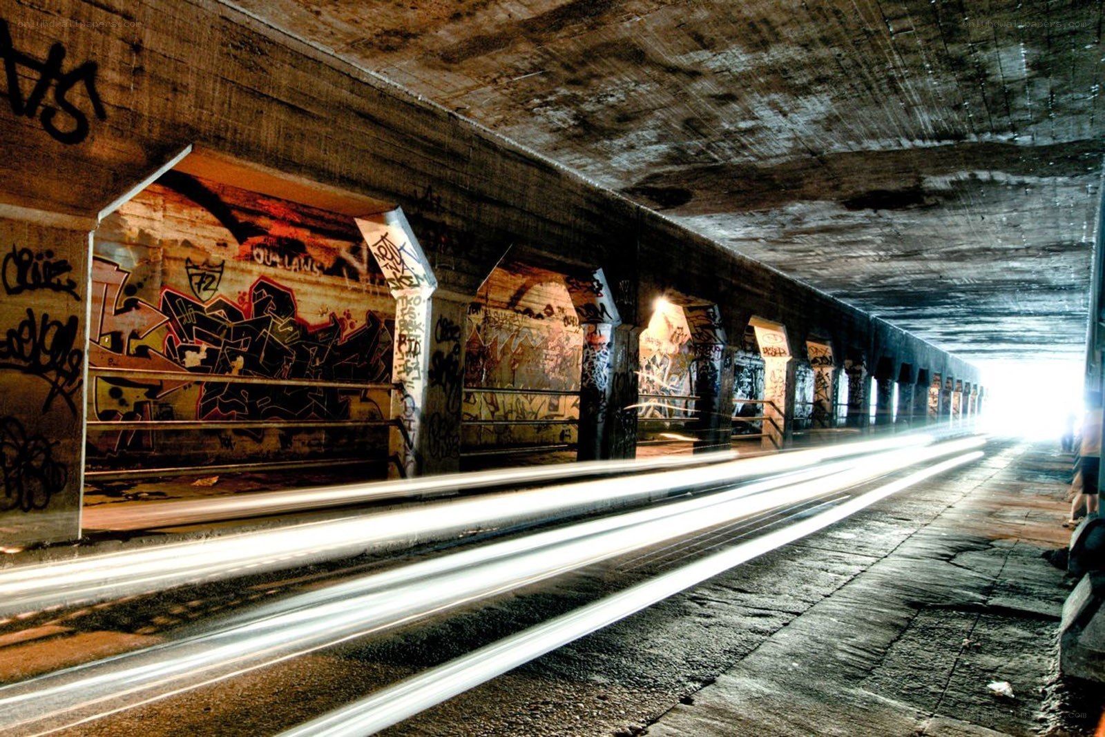 Graffiti tunnel with light trails