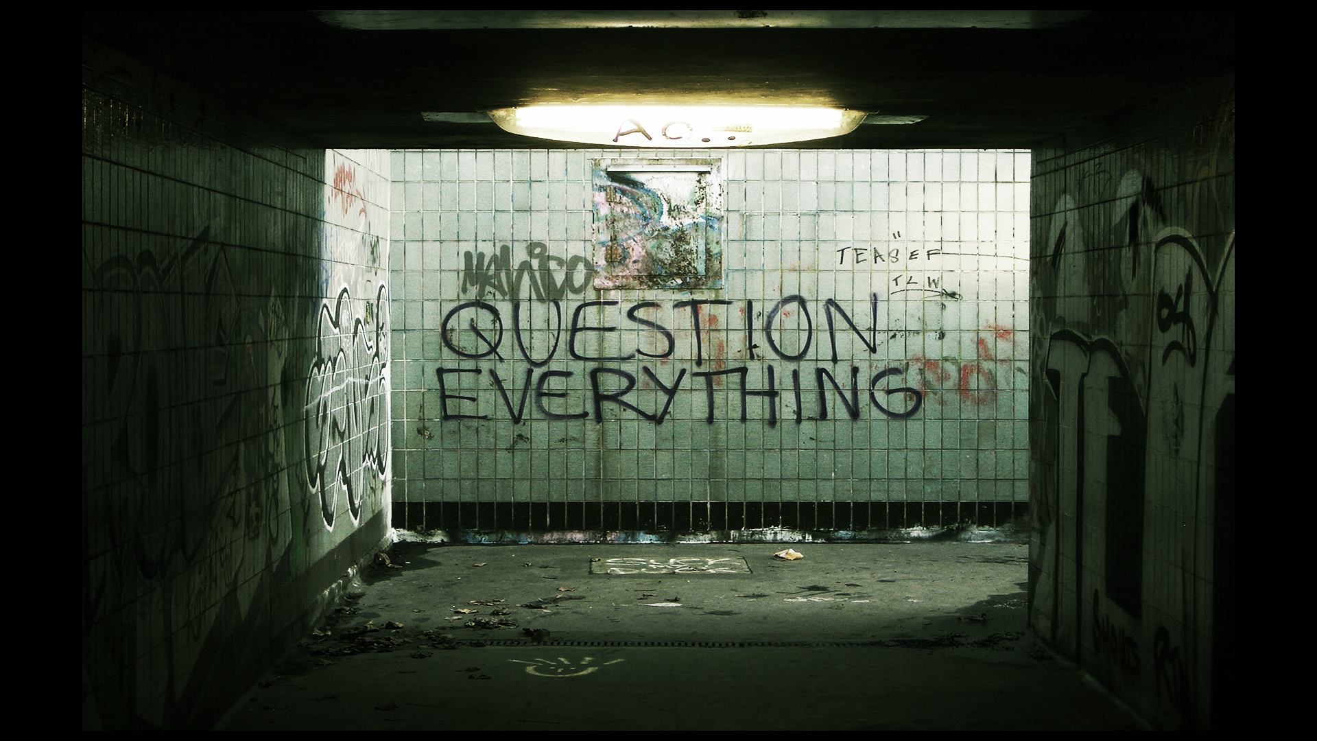 Graffiti tunnel with question everything