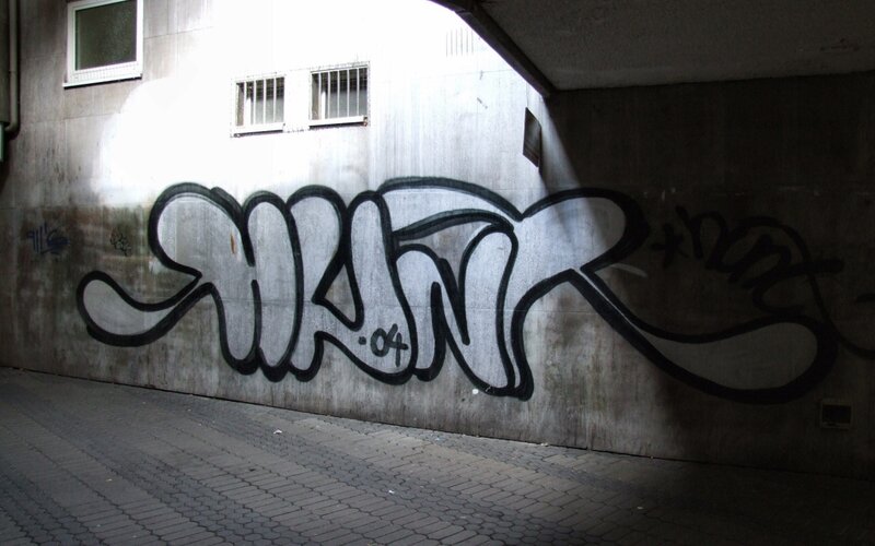 graffiti under a bridge