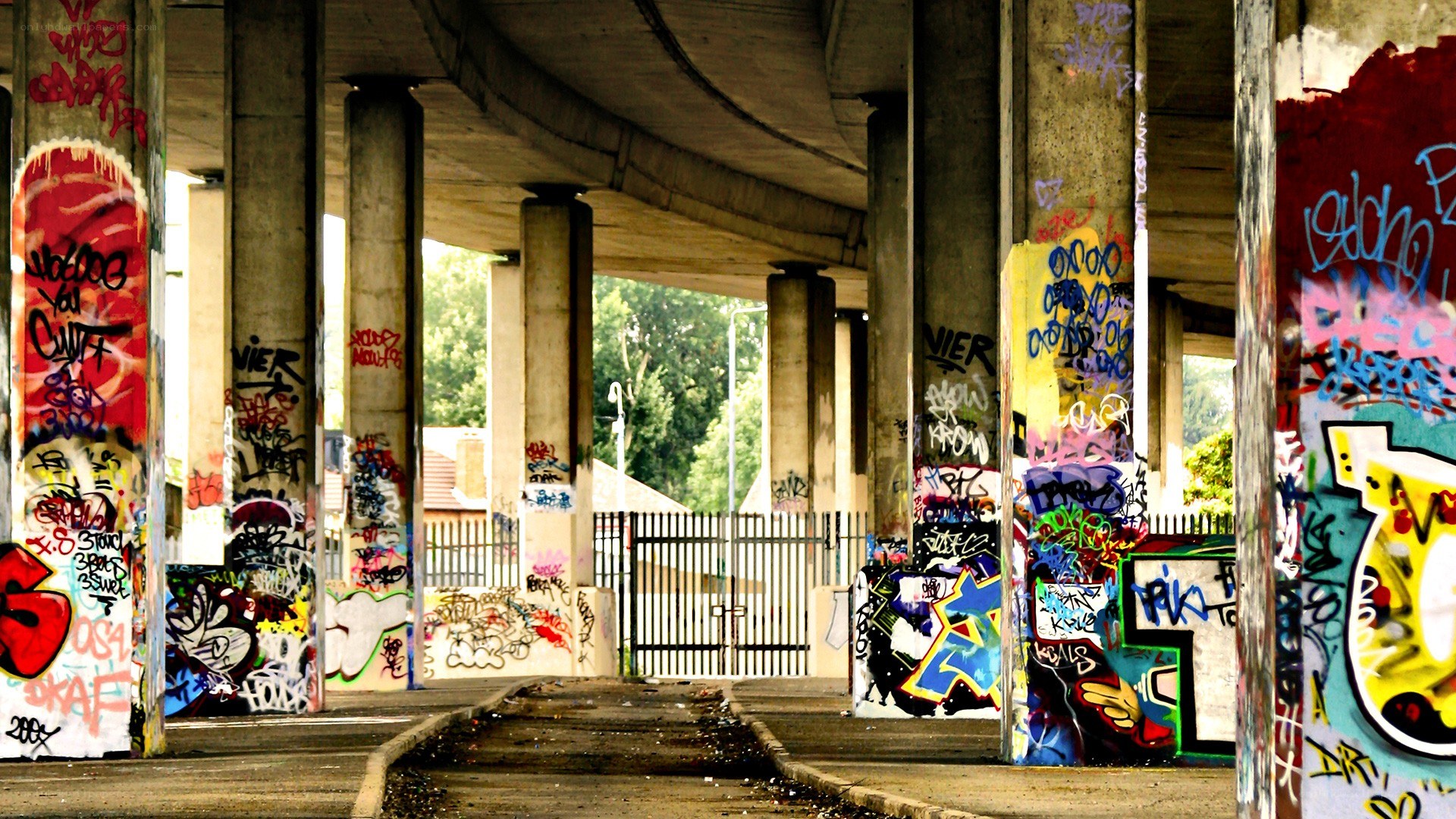 graffiti under a concrete overpass