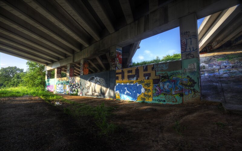 Graffiti under a highway overpass