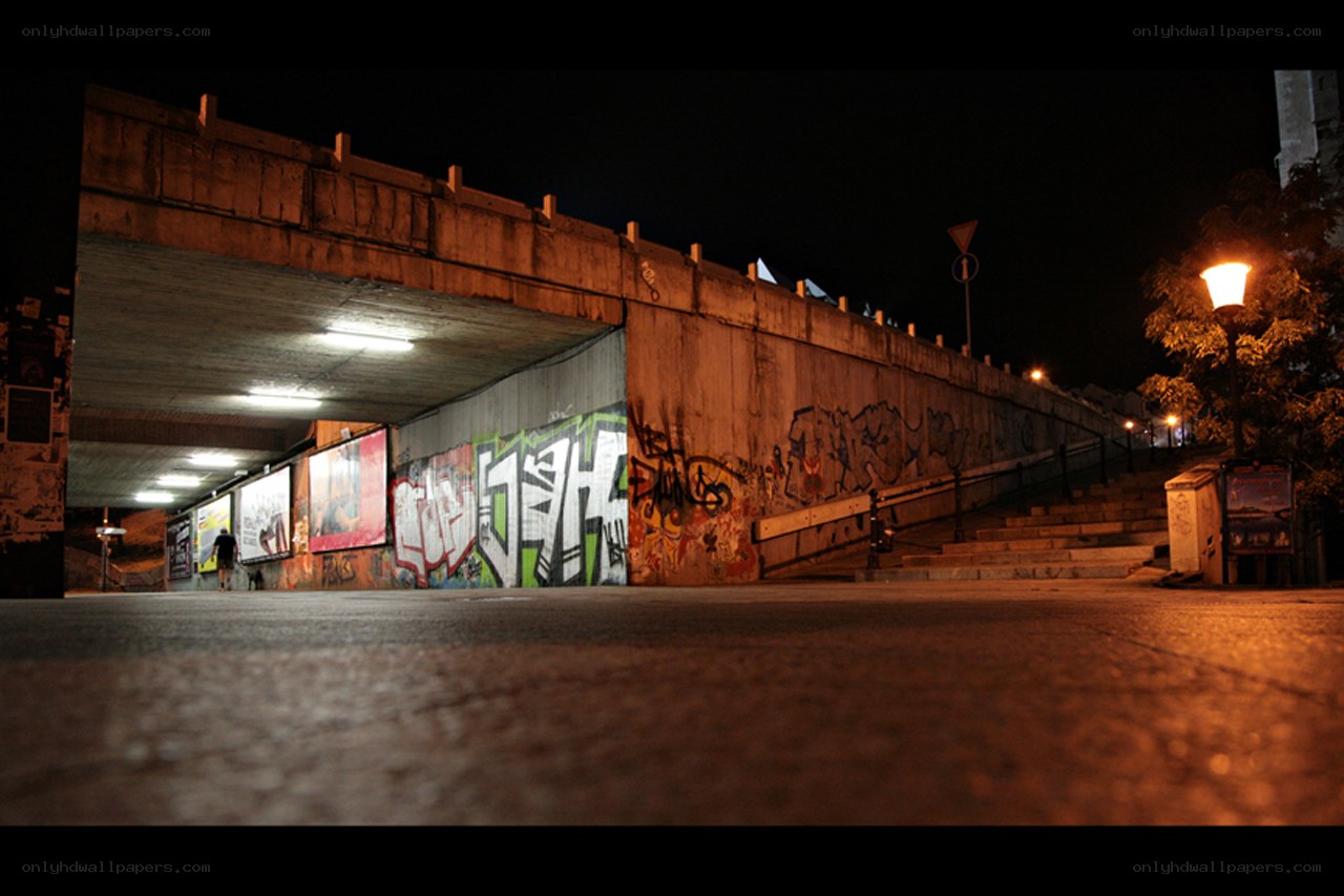 graffiti under bridge at night