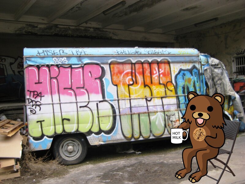 Graffiti van with cartoon bear