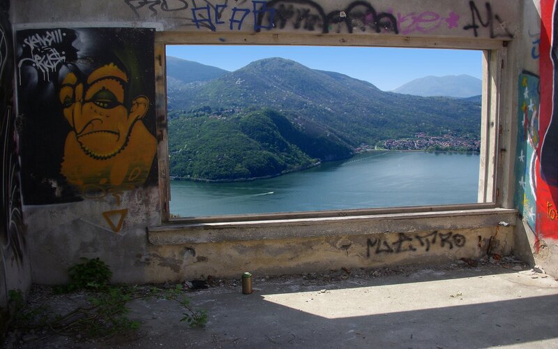 Graffiti view of lake and mountains
