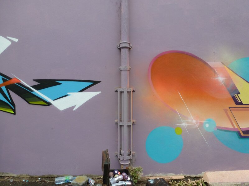 graffiti wall with pipe