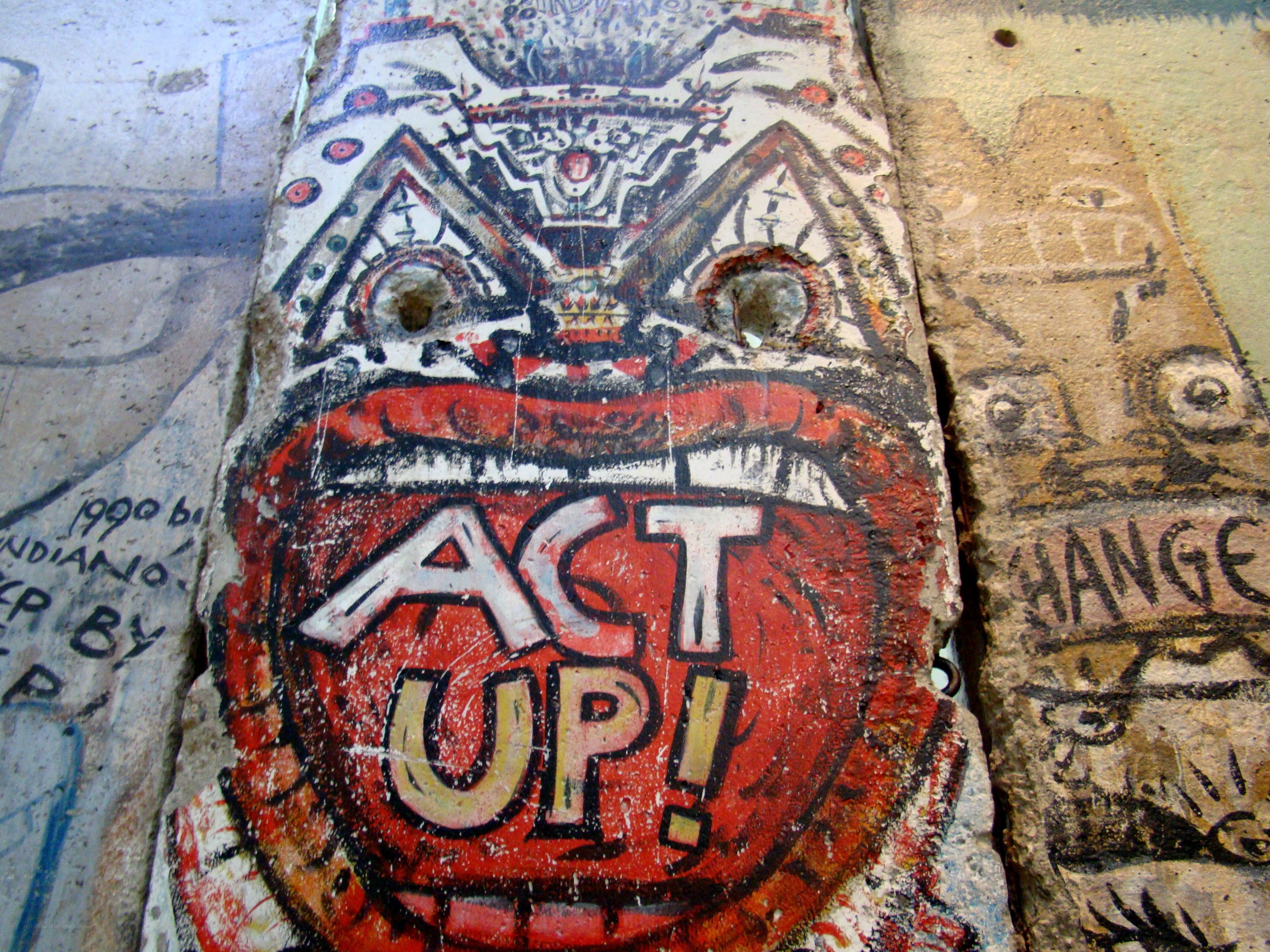 graffiti with 'act up' message