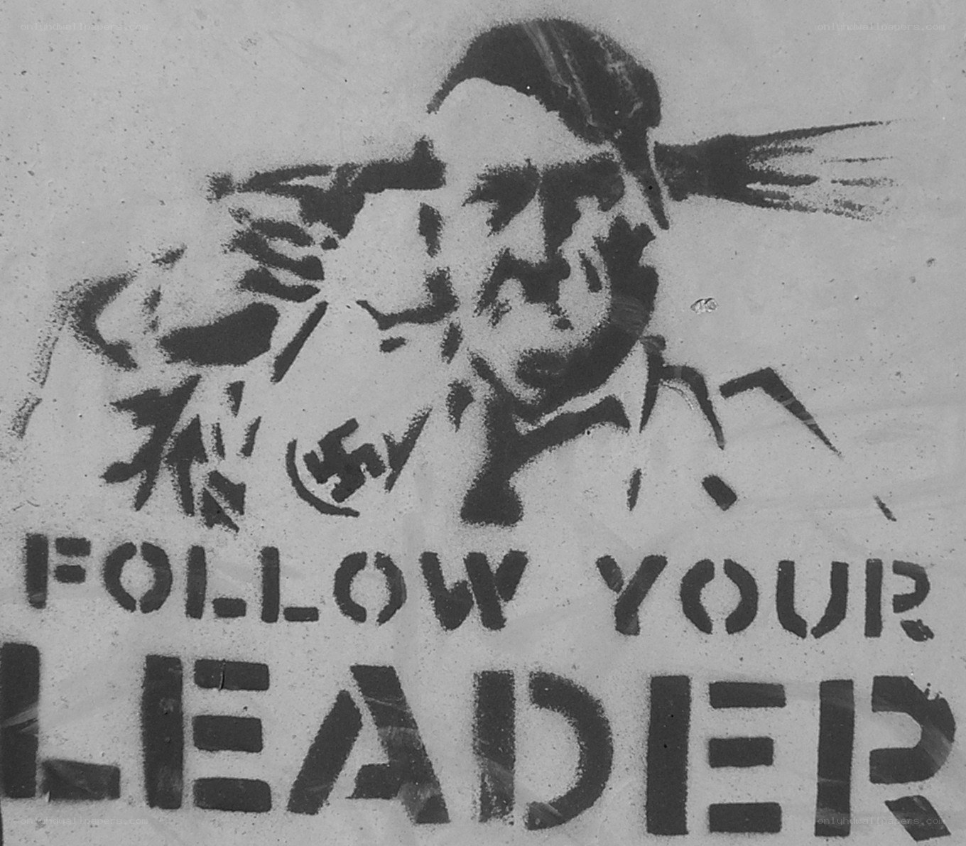 graffiti with leader slogan