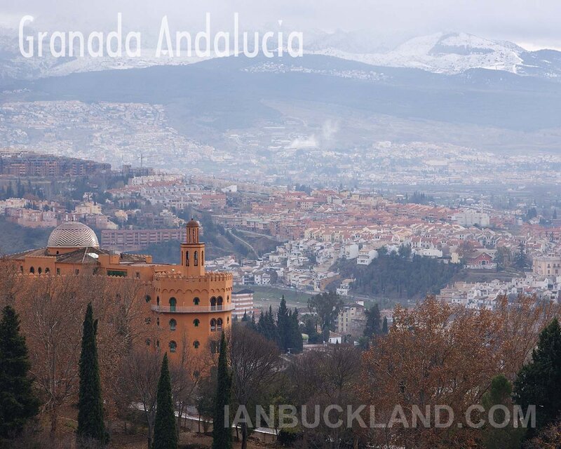 Granada cityscape with snow-capped mountains