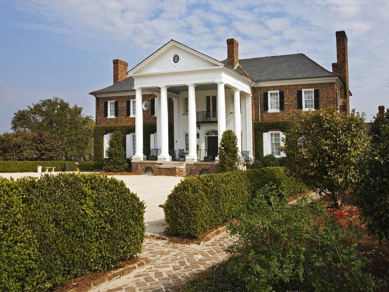 grand brick mansion with columns