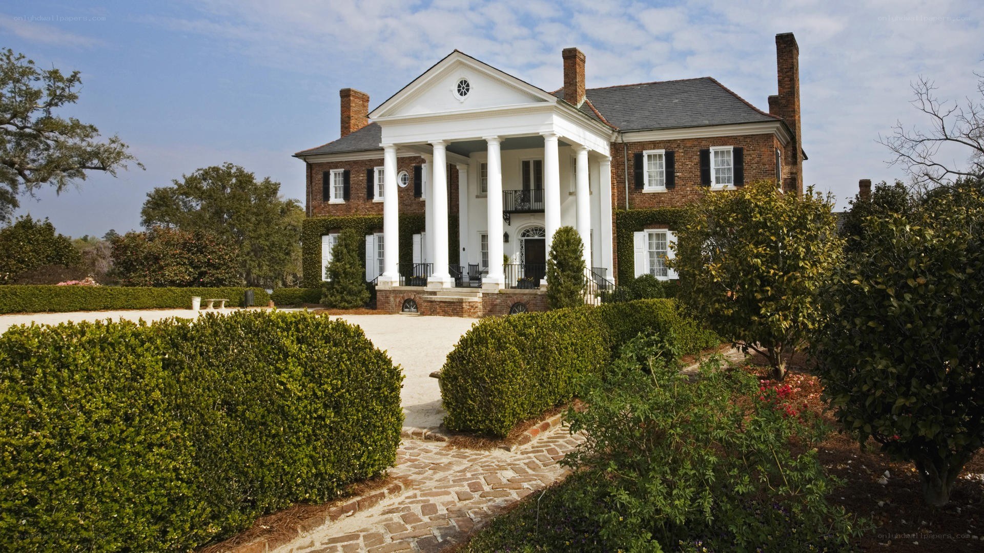 grand brick mansion with columns