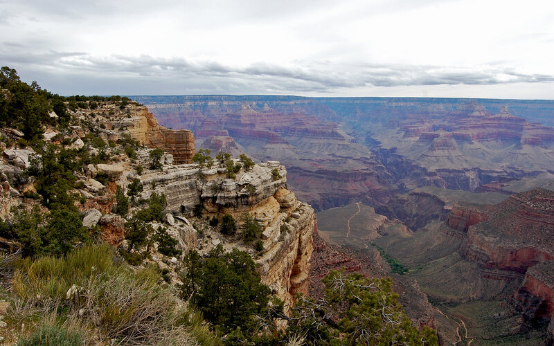 Grand Canyon vista under cloudy sky