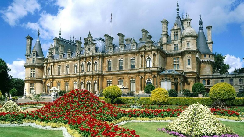 grand castle with flower gardens