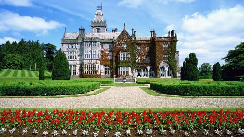 grand castle with manicured gardens