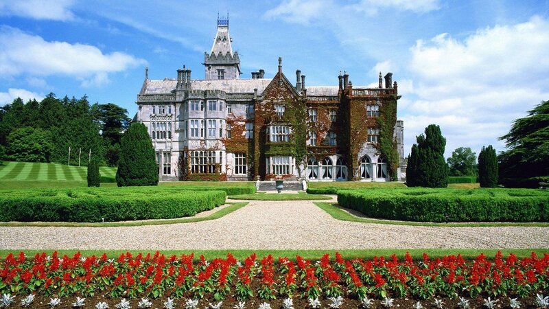 grand castle with manicured gardens