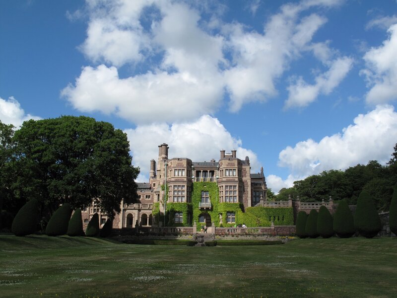 grand castle with manicured gardens