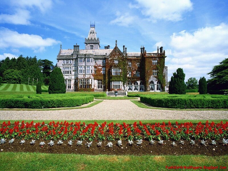 grand castle with manicured gardens