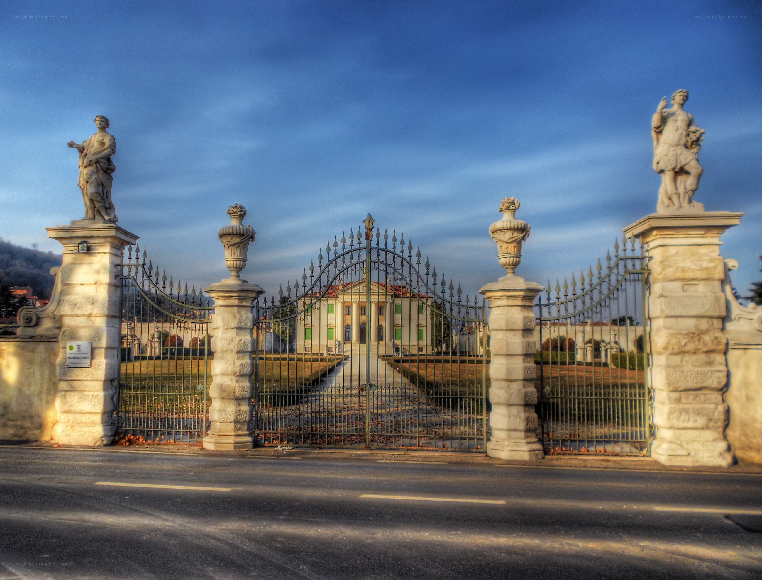 Grand estate gate with statues