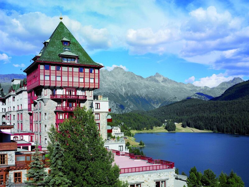Grand hotel by a mountain lake