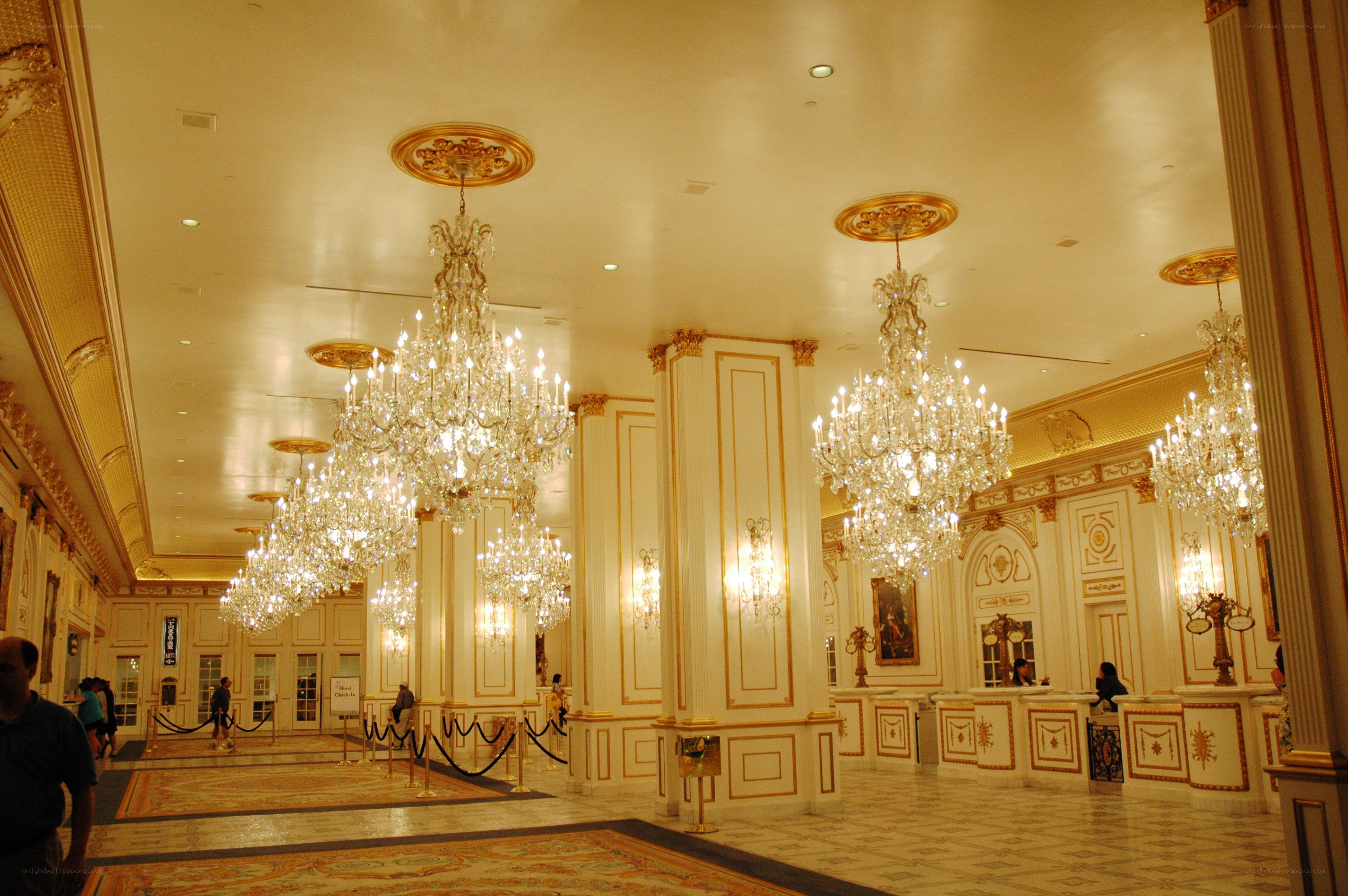 Grand hotel lobby with chandeliers