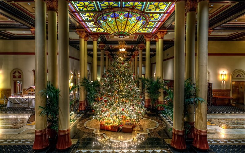 Grand hotel lobby with Christmas tree