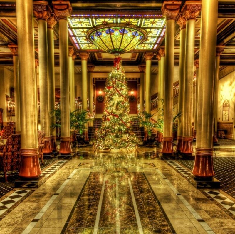 Grand hotel lobby with Christmas tree