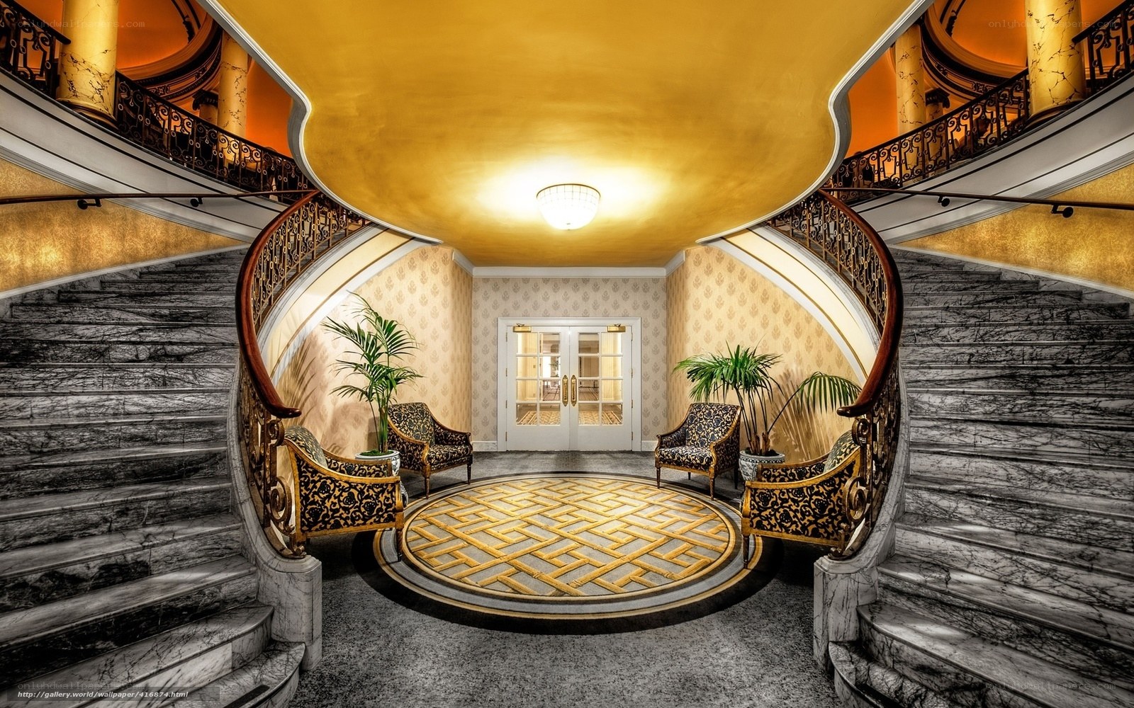 Grand hotel lobby with spiral staircase