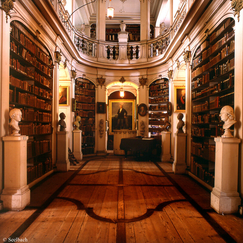 Grand library hall with bookshelves