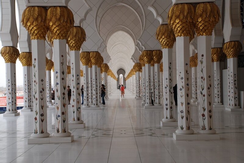 Grand mosque hall with golden columns