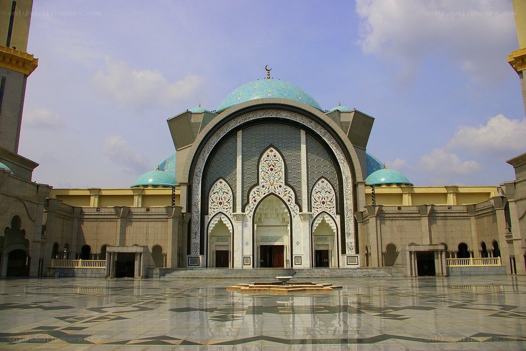 grand mosque with blue domes