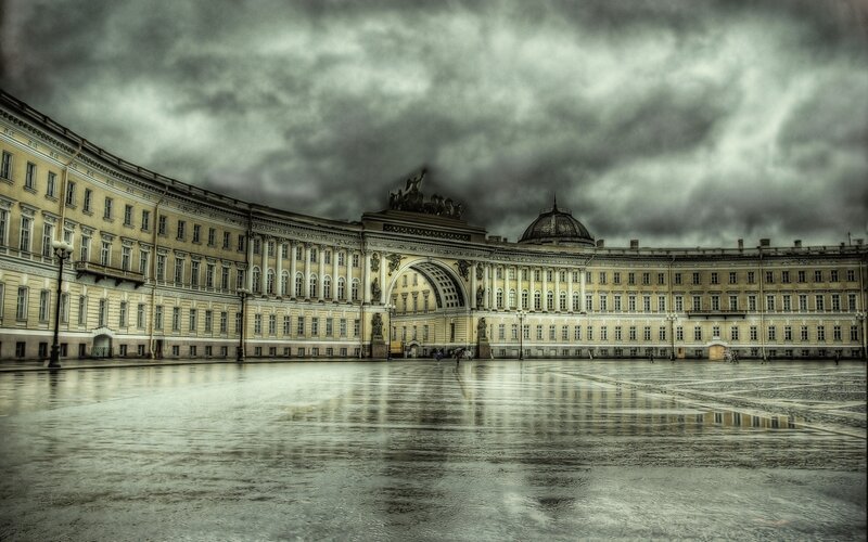 Grand palace under stormy sky
