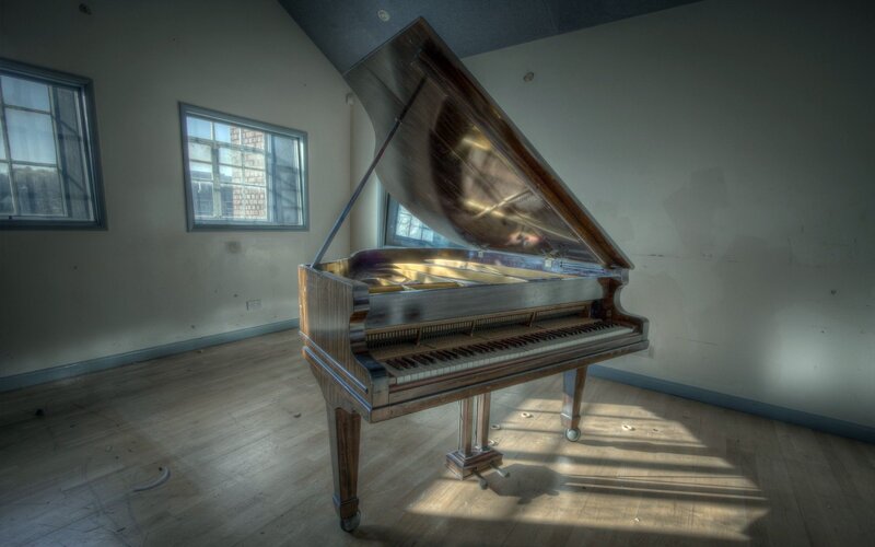 Grand Piano in Empty Room