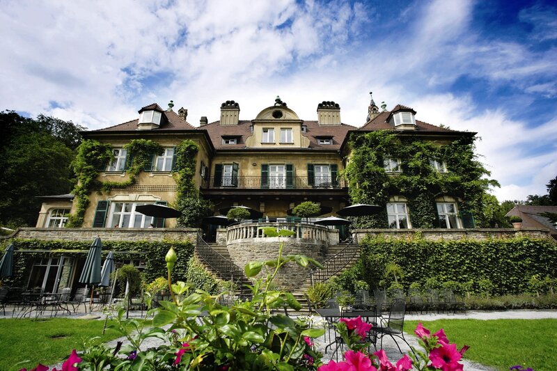 Grand villa with ivy-covered walls
