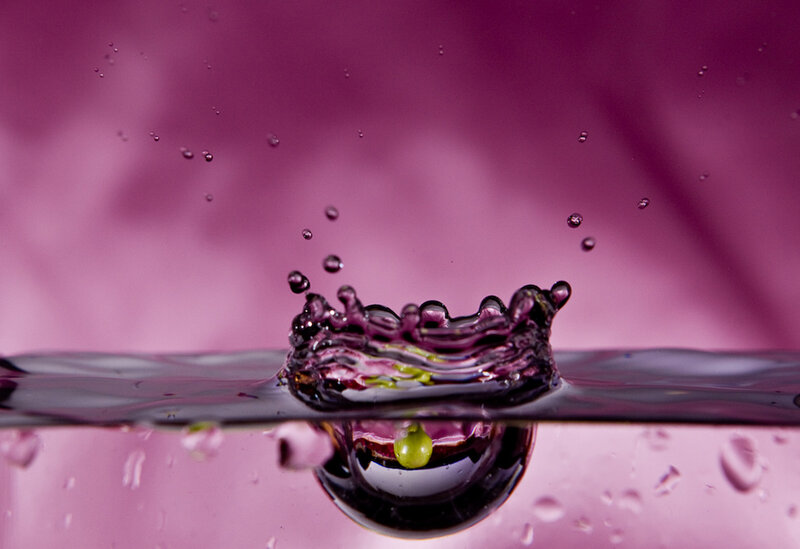 grape drop in purple liquid
