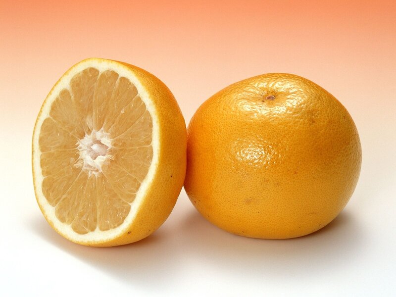 grapefruit halves on gradient