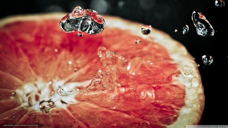 Grapefruit Slice with Water — Red, Dramatic, Photograph