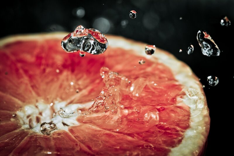 Grapefruit Slice with Water — Red, Dramatic